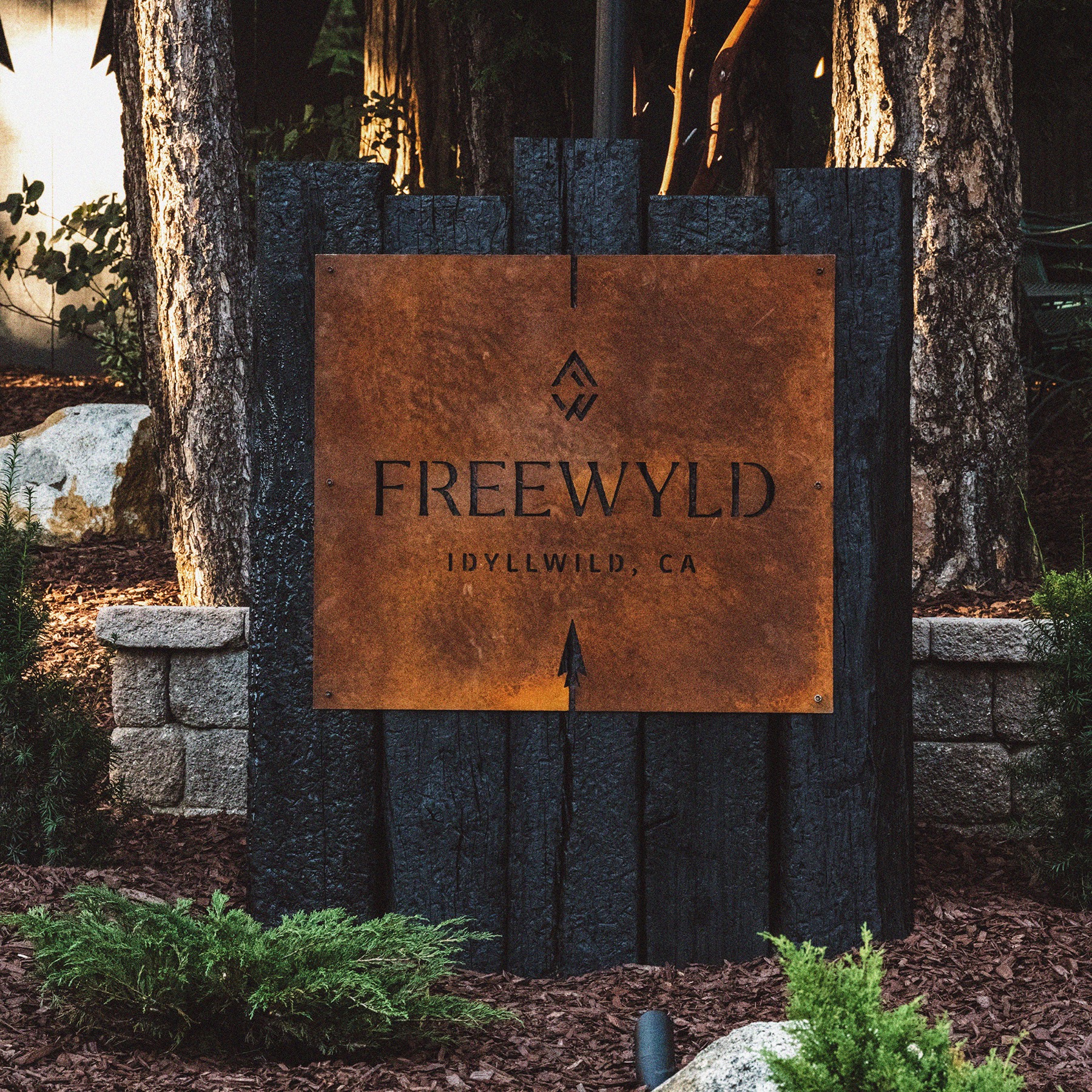 Custom rust-patina metal Freewyld property sign in Idyllwild, California